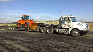heavy duty towing, equipment towing, landoll service, lowboy towing